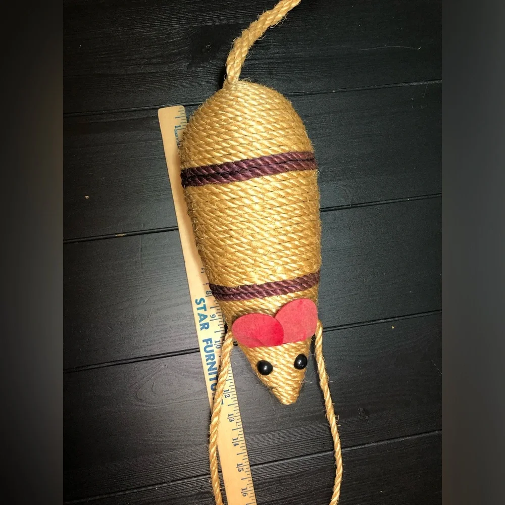 Decor toy mouse for a cat made of jute rope isolated.